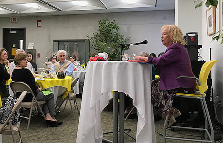 Author Bev Marshall discussing her work in 2019 with attendees at the Friends' annual membership tea