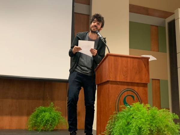 Akbar speaking at the Common Read Fall 2019