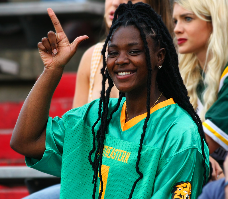 Student at a Football Game Showing Lion Spirit