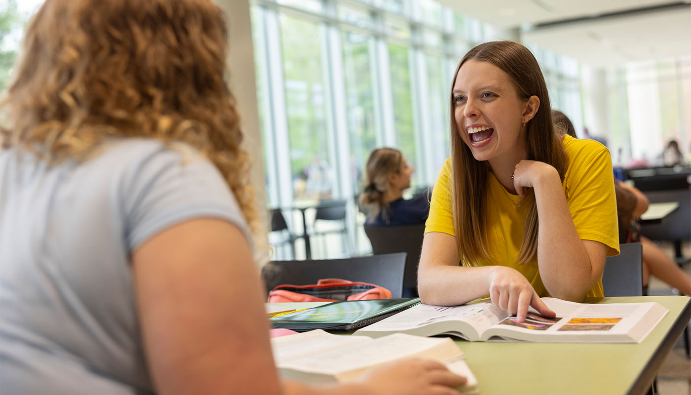 Students talking in the student union.